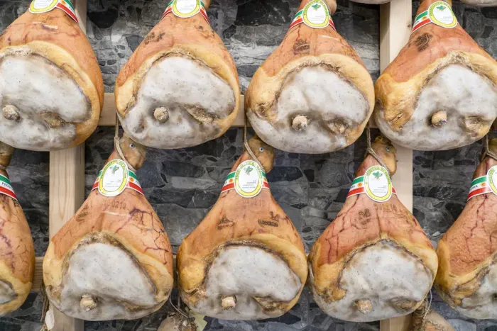 Framed Print : Italy traditional ham (prosciutto) Parma hanging in maturation room Framed Print : Italy traditional ham (prosciutto) Parma hanging in maturation room