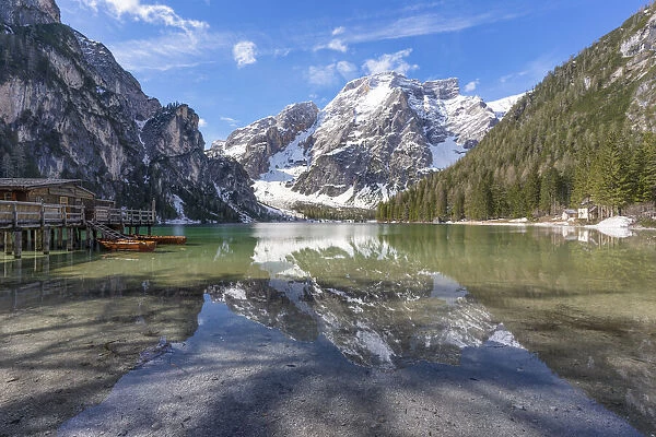 Italy, Trentino, Dolomites: morning reflections on the Braies Lake