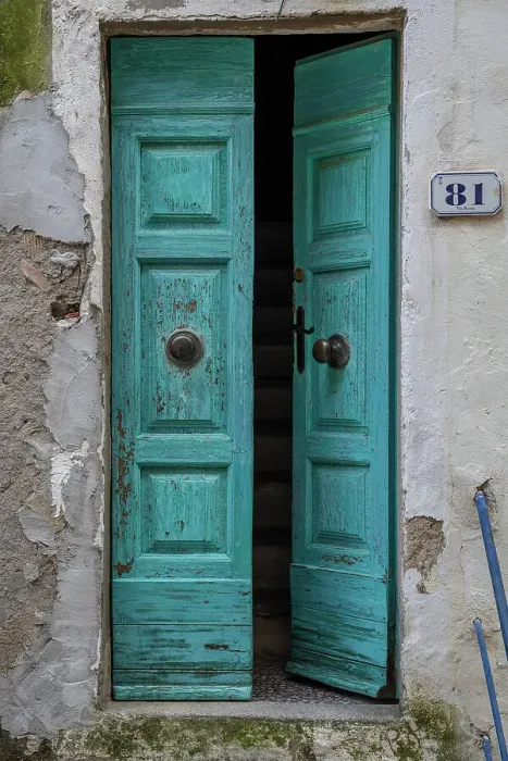 Framed Print : Italy, Tuscany, Elba. An old wooden entrance door to a house in Capoliveri Framed Print : Italy, Tuscany, Elba. An old wooden entrance door to a house in Capoliveri