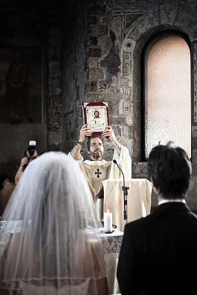 Italian bride and priest