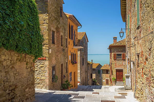 Italy, Umbria. A tiny street in the little village of Monte del Lago on the Lake Trasimeno