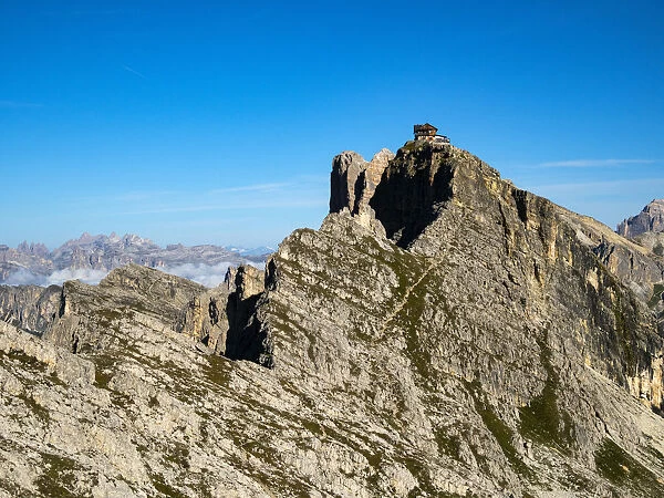 Italy, Veneto, Dolomites, Giau Pass, Nuvolau mountain hut from the top of Gusela