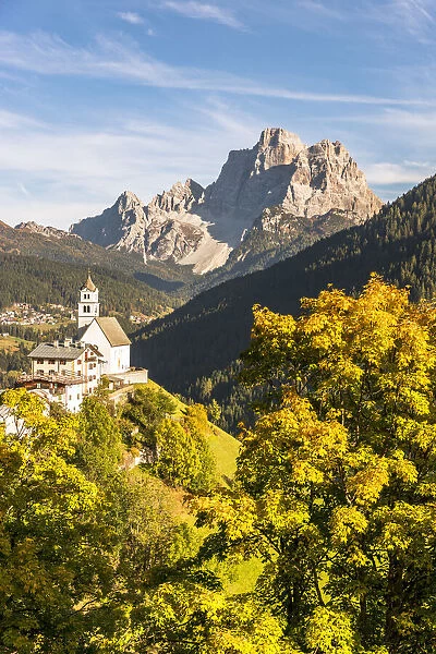 Italy, Veneto, province of Belluno, the iconic church of Colle Santa Lucia with mount