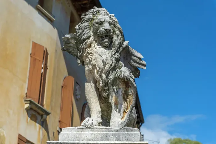 Framed Print : Italy, Veneto. A statue of a lion with wings in the town of Asolo