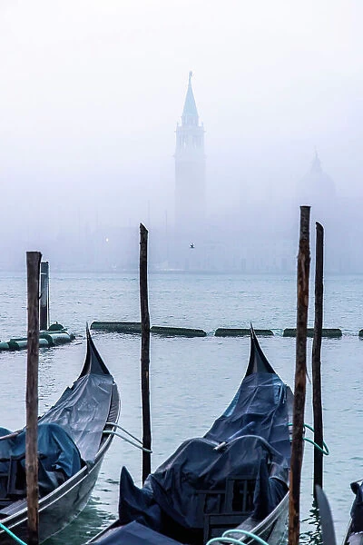 Italy, Veneto, Venice, the Basilica di San Giorgio Maggiore & gondolas on a foggy day
