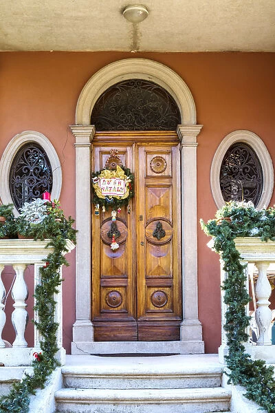 Italy, Veneto, Venice, Murano island. Entrance to an old venetian house decorated