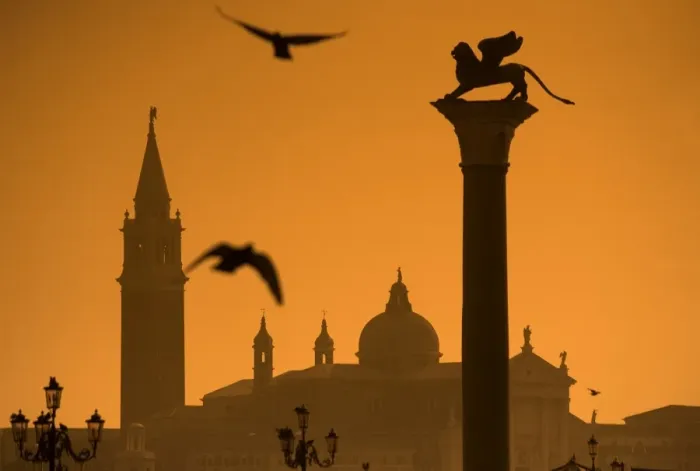 Framed Print : Italy, Veneto, Venice; San Giorgio Maggiore in the background with the lion of Venice in the foreground, seen from Piazza Framed Print : Italy, Veneto, Venice; San Giorgio Maggiore in the background with the lion of Venice in the foreground, seen from Piazza