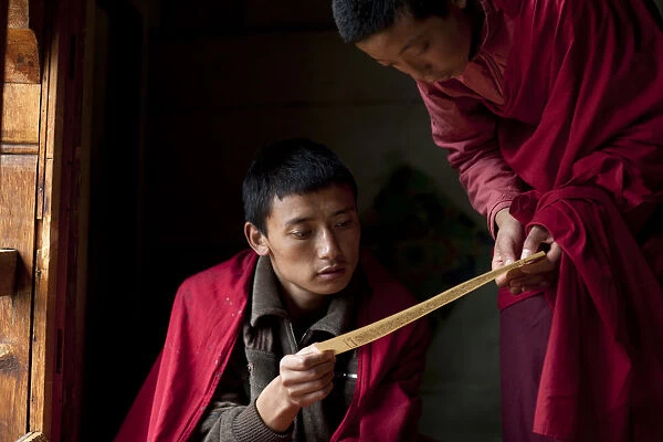 Jakar, Bhutan. Monks at the Jakar Dzong in Bhutan