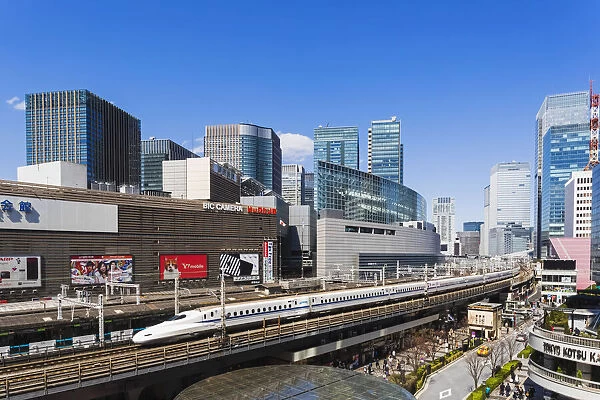 Japan, Honshu, Tokyo, Yurakucho, Skyline and Shinkansen Bullet Train