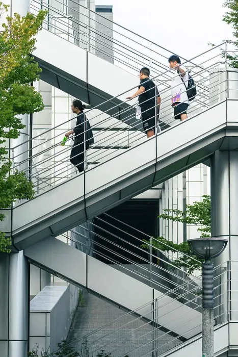 Framed Print : Japanese guys descending geometric scales in Tokyo Framed Print : Japanese guys descending geometric scales in Tokyo