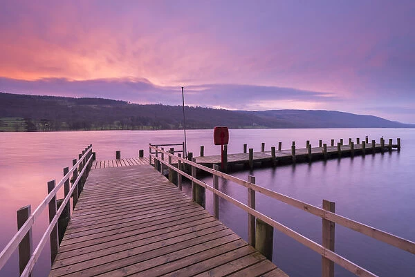 Jetty on Coniston Water at sunrise, Lake District, Cumbria, England
