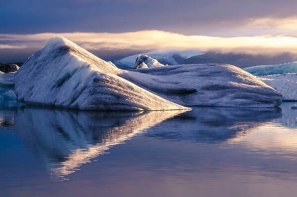 Jokulsarlon glacier lagoon, Iceland. Blocks of ice floating in the lagoon at sunset