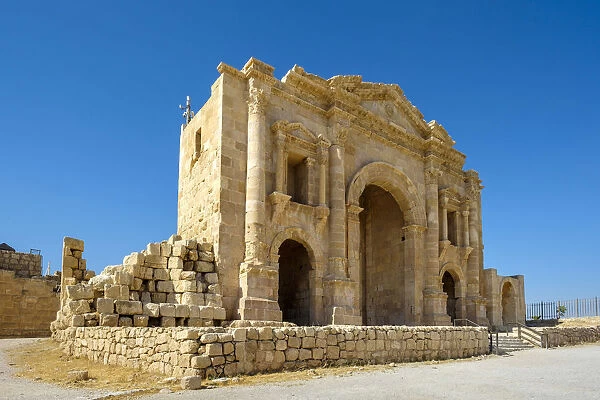 Jordan, Jerash Governorate, Jerash. Arch of Hadrian, a triple-arched gateway built