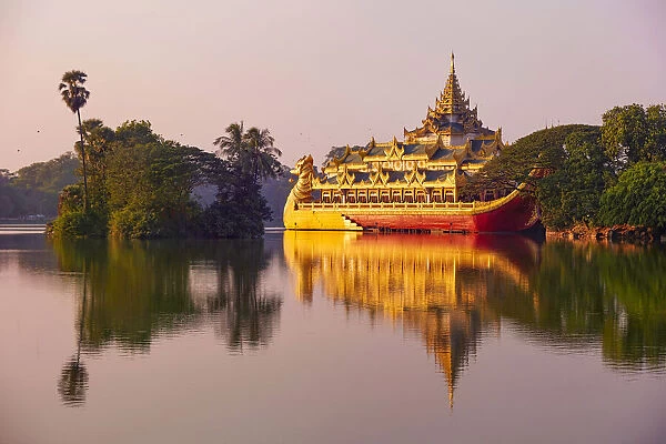 The Karaweik boat reflected in the waters of the Kandwagyi Lake in Yangon, Myanmar