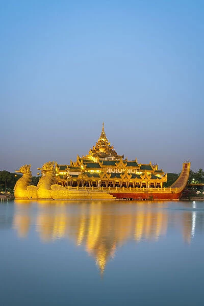 Karaweik Palace on Kandawgyi Lake at dusk, Yangon, Yangon Region, Myanmar