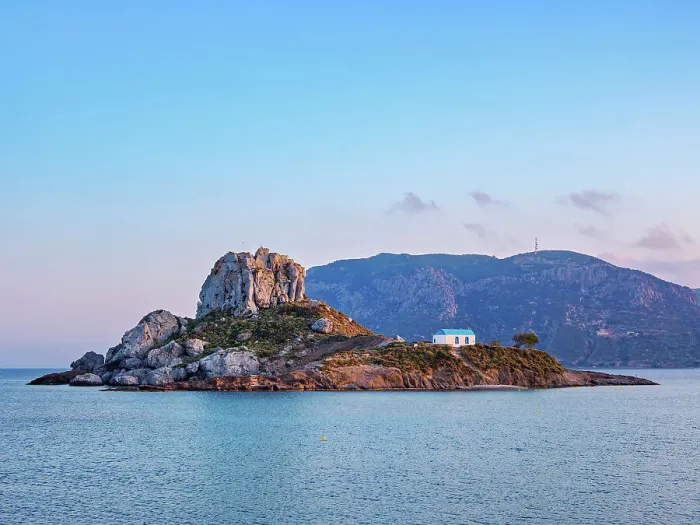 Framed Print : Kastri Island seen from Agios Stefanos Beach at sunset, Kamari Bay, Kos Island, Dodecanese, Greece Framed Print : Kastri Island seen from Agios Stefanos Beach at sunset, Kamari Bay, Kos Island, Dodecanese, Greece