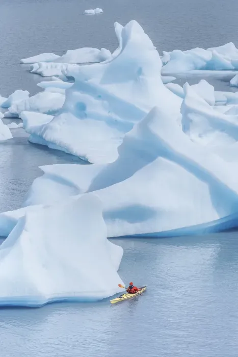 Framed Print : Kayaker paddling among icebergs, Torres del Paine National Park, Patagonia, Chile Framed Print : Kayaker paddling among icebergs, Torres del Paine National Park, Patagonia, Chile