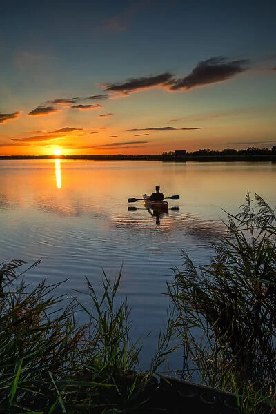Kayaker at Sunset, Norfolk Broads National Park, Norfolk, England