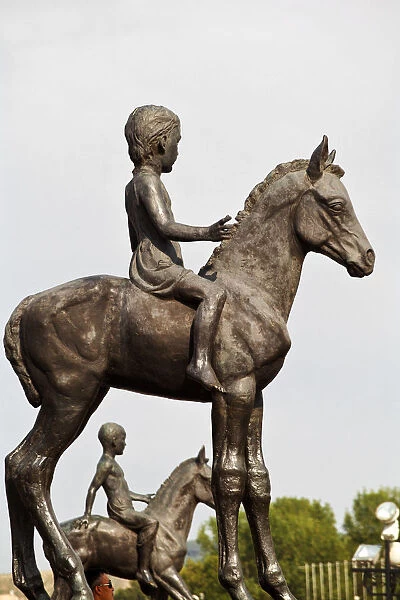 Kazakhstan, Almaty, Respublika Alangy Soviet created ceremonial square Statue of girl