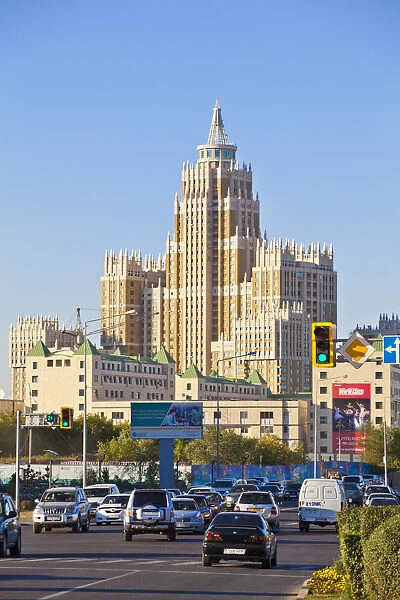 Kazakhstan, Astana, Traffic on road by Triumph of Astana - a 480-apartment housing estate