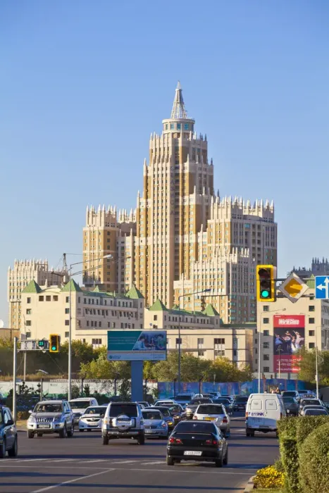 Framed Print : Kazakhstan, Astana, Traffic on road by Triumph of Astana - a 480-apartment housing estate