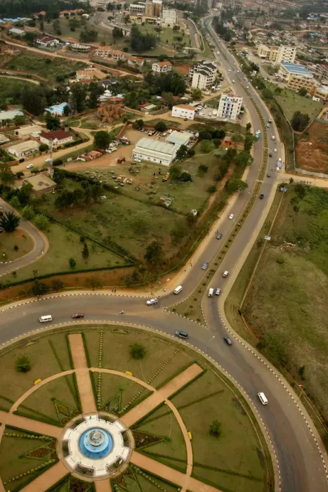 Framed Print : Kigali, Rwanda. A carefully modelled roundabout marks the beginning of the airport road Framed Print : Kigali, Rwanda. A carefully modelled roundabout marks the beginning of the airport road