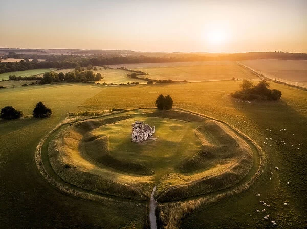 Knowlton Church and earthworks from the air at sunrise, Knowlton, Dorset, England, UK