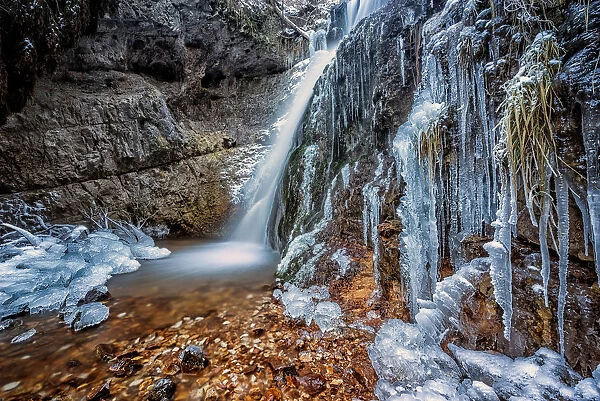 Koflertal waterfall in winter, Non Valley, Trentino Alto Adige, Italy
