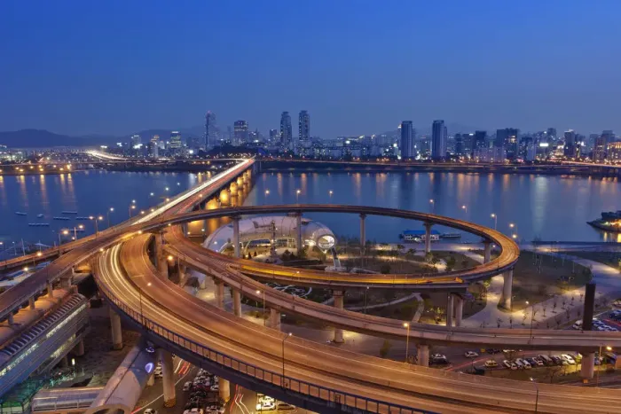 Framed Print : Korea, Seoul, Tukseom, Traffic on Cheongdam On-Ramp and Cheongdam bridge, over Hangang