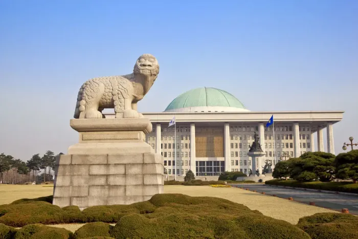 Framed Print : Korea, Seoul, Yeouido, Statue of stone lion, National Assembly building