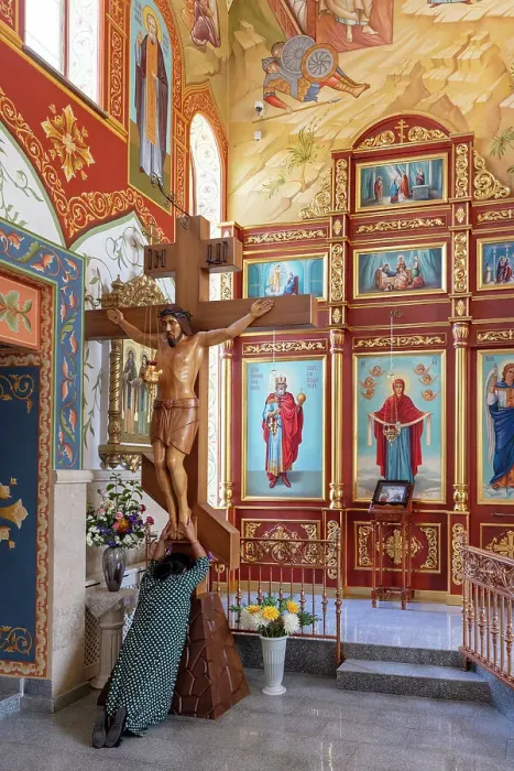 Framed Print : Kyrgyzstan, Bishkek, Holy Resurrection Cathedral, a local woman prays beneath Jesus on the cross Framed Print : Kyrgyzstan, Bishkek, Holy Resurrection Cathedral, a local woman prays beneath Jesus on the cross