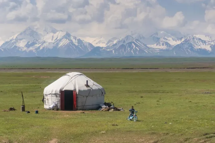 Framed Print : Kyrgyzstan landscape with a Yurt and children in foreground Framed Print : Kyrgyzstan landscape with a Yurt and children in foreground