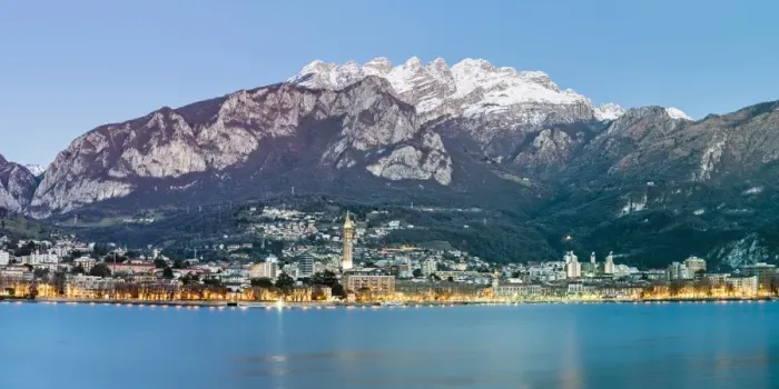Framed Print : Lake Como, Lombardy, Italy. Panoramic view of Lecco city at dusk with the Resegone Framed Print : Lake Como, Lombardy, Italy. Panoramic view of Lecco city at dusk with the Resegone