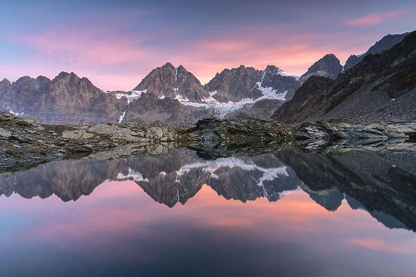 Lake of Forbici during sunrise and in background Bernina Group, Valmalenco, Valtellina, Sondrio Province, Lombardy, Italy