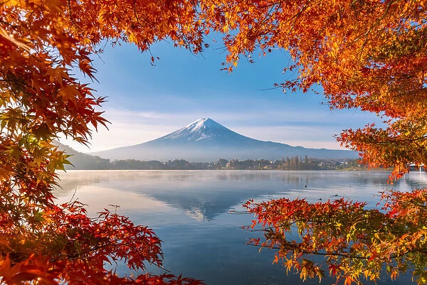 Lake Kawaguchi and Mt Fuji framed by red maple leaves in autumn, Yamanashi Prefecture