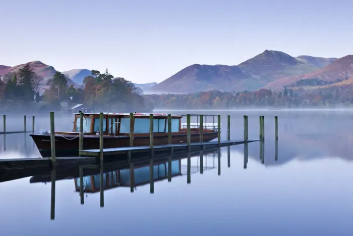 Framed Print : Lakeland Mist pleasure boat moored on a placid Derwent Water on a misty and frosty Framed Print : Lakeland Mist pleasure boat moored on a placid Derwent Water on a misty and frosty