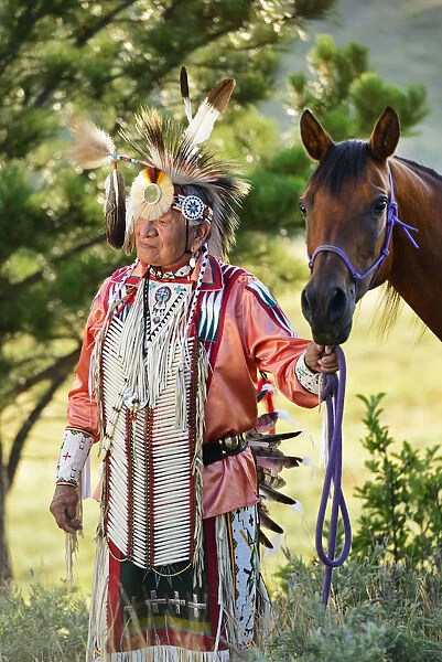 Lakota Indian in the Black Hills with Horse, Western South Dakota, USA. MR