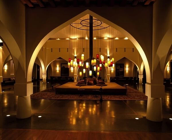 Lamps hang in the main reception of the Chedi