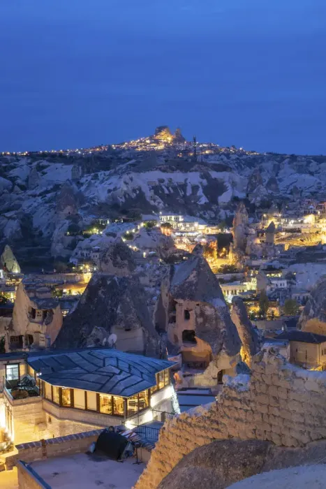 Framed Print : Landscape of the ancient town of Goreme at duskwith Uchisar fortrees in the background Framed Print : Landscape of the ancient town of Goreme at duskwith Uchisar fortrees in the background