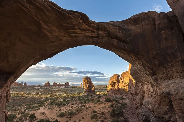 Landscape through Double Arch. Arches National Park, Moab, Grand County, Utah, USA