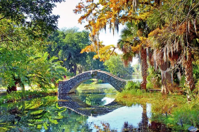 Framed Print : Langles Bridge, built in 1902, is an old stone bridge that crosses a preserved bayou in City Park, New Orleans. The park holds the world's largest collection of mature live oaks. Louisiana, USA Framed Print : Langles Bridge, built in 1902, is an old stone bridge that crosses a preserved bayou in City Park, New Orleans. The park holds the world's largest collection of mature live oaks. Louisiana, USA