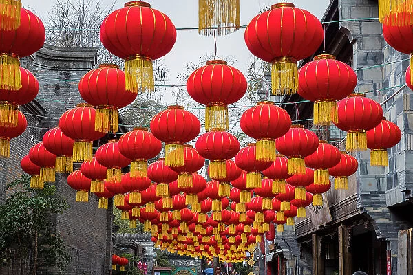 Lanterns hanging above city street, Chengdu, China