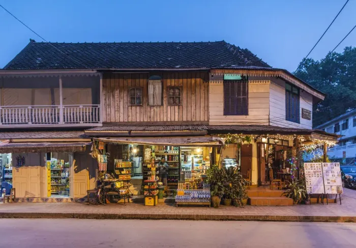 Framed Print : Laos, Luang Prabang, Mekong Riverfront buildings on Khem Khong Road, evening