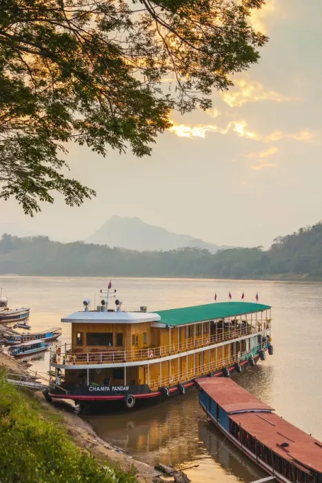 Framed Print : Laos, Luang Prabang, Riverboats on the Mekong River, sunset