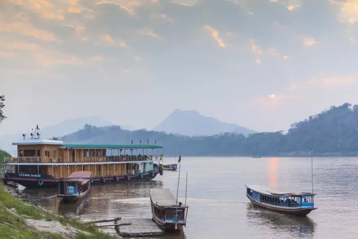 Framed Print : Laos, Luang Prabang, Riverboats on the Mekong River, sunset Framed Print : Laos, Luang Prabang, Riverboats on the Mekong River, sunset