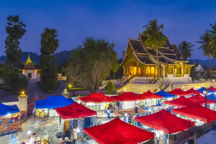 Framed Print : Laos, Luang Prabang, Sisavangvong Road, Handicraft Night Market and Wat Ho Pha Bang