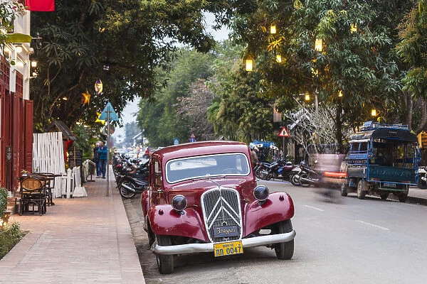 Laos, Luang Prabang, Sisavangvong Road, 1950s-era vintage French Citroen Traction