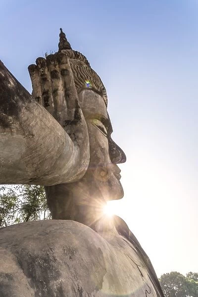 Laos, Vientiane. Giant reclining Buddha, 120 metres long, at Buddha park (Xieng Khuan)