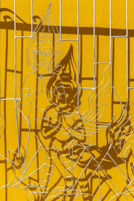 Framed Print : Laos, Vientiane, Wat Si Muang, window gates with Buddha figure Framed Print : Laos, Vientiane, Wat Si Muang, window gates with Buddha figure