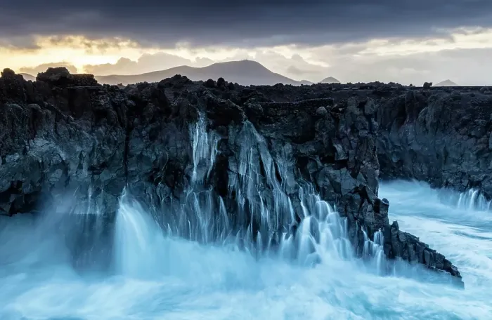 Framed Print : Large waves breaking on the volcanic coastline at dawn, Los Hervideros, Yaiza, Timanfaya National Park, Lanzarote, Canary Islands, Spain Framed Print : Large waves breaking on the volcanic coastline at dawn, Los Hervideros, Yaiza, Timanfaya National Park, Lanzarote, Canary Islands, Spain